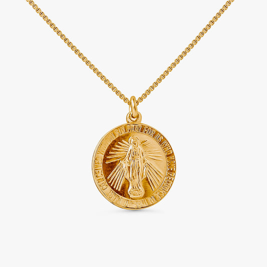 Annika Mary 14k gold plated box chain necklace with round Miraculous Mary medallion pendant on white background.