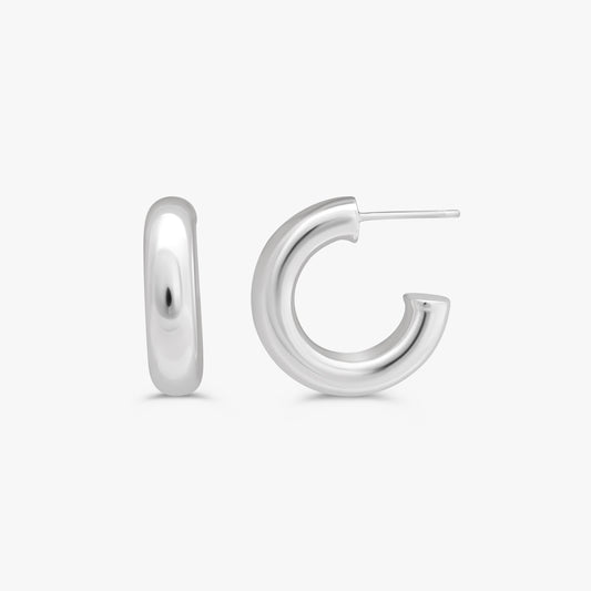 A pair of polished sterling silver hoop earrings, one shown from a front-facing perspective and the other from a side profile showing the post, on a light gray background.