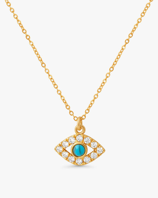 Liora evil eye necklace in 14k gold plating with a turquoise-tone center and crystal halo, on a white background