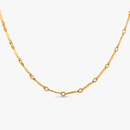 Dagny Flat Bar Layering Necklace in 14k gold filled station chain on white background.