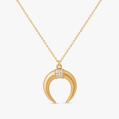 Fara Double Horn Tusk Necklace in 14k gold filled metal with crystal studded crescent pendant on white background