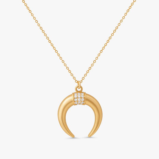 Fara Double Horn Tusk Necklace in 14k gold filled metal with crystal studded crescent pendant on white background
