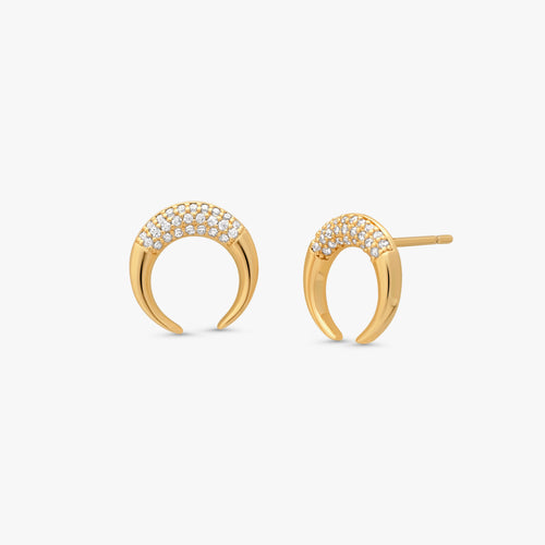 Pair of Bravi Double Horn Studs in 14k gold plated metal with crystal accents on white background