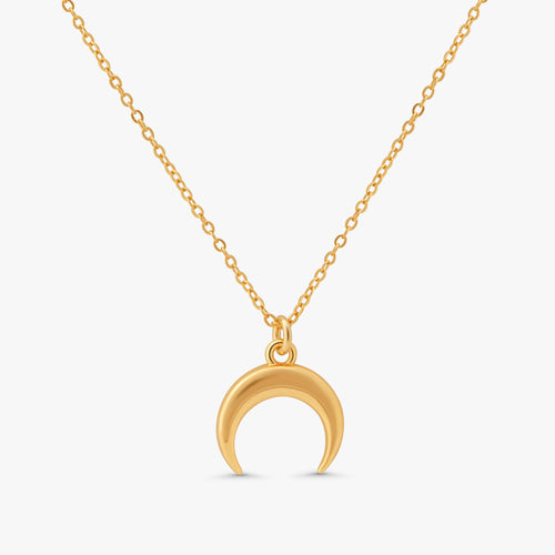 A gold crescent moon pendant necklace on a delicate gold chain, shown against a light gray background.