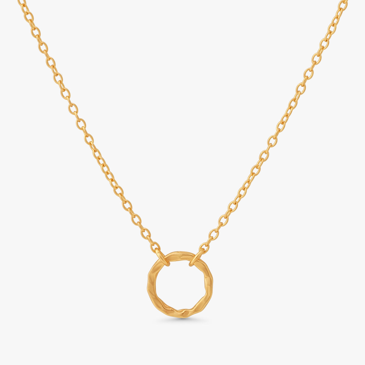 A delicate gold chain necklace featuring a textured, open circular pendant, displayed against a clean white background.