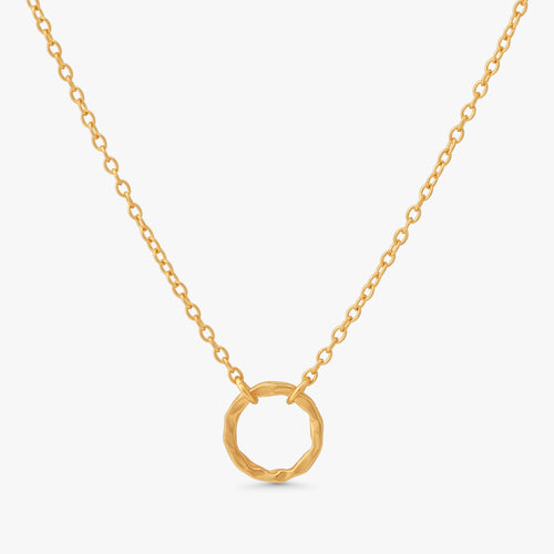 A delicate gold chain necklace featuring a textured, open circular pendant, displayed against a clean white background.