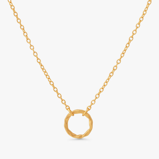 A delicate gold chain necklace featuring a textured, open circular pendant, displayed against a clean white background.
