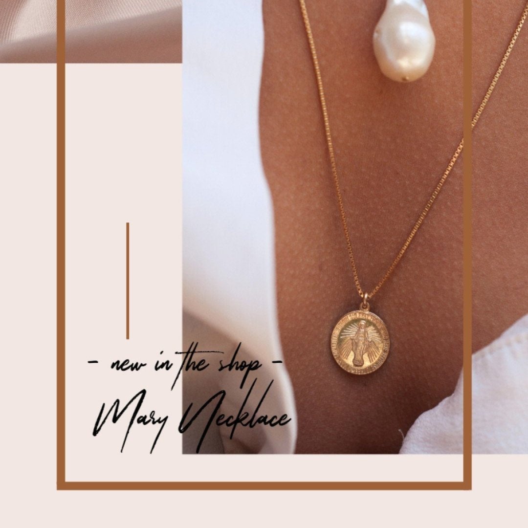 Annika Mary 14k gold plated medallion necklace lifestyle photo with decorative frame and text overlay