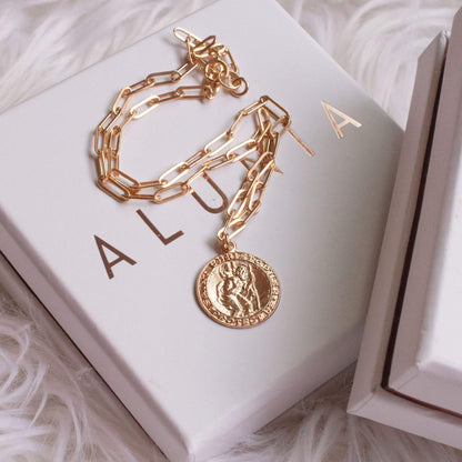 Auri Saint Christopher 14k gold filled coin necklace displayed on white Alunia gift box