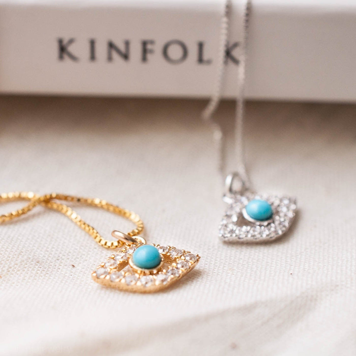 Liora Evil Eye 14k gold-plated and Sterling Silver necklace and matching pendant displayed