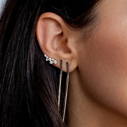Pair of women's Sterling Silver Freja Ear Climbers featuring clustered cubic zirconia crystals shown front and side view.