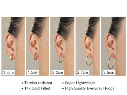 Size comparison chart showing a woman wearing various sizes of 14k Gold Filled Zola Hoop Earrings.