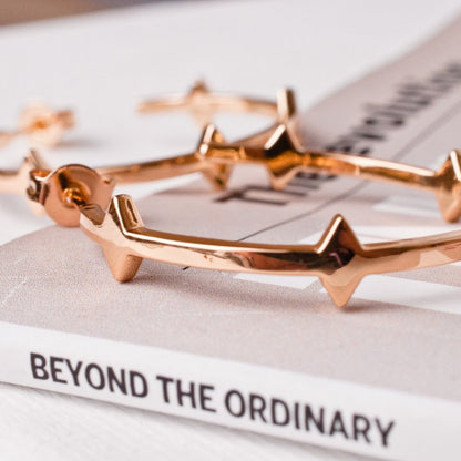 Gold Hoop earrings with spike accent
